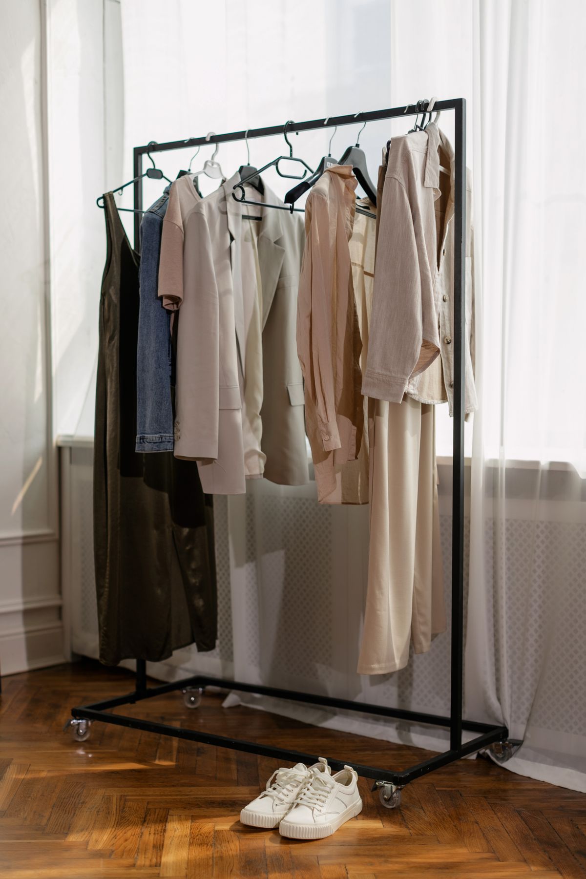 A clothing rack with a neutral capsule collection